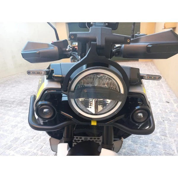 Moto Explorer RideTrak black navigation stabiliser mounted on a Husqvarna Norden 901 motorcycle headlight assembly
